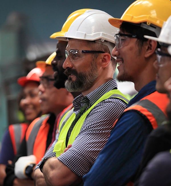 Line up of construction employees